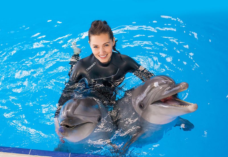 Що означає плавати з дельфінами у сні: тлумачення за різними сонникам